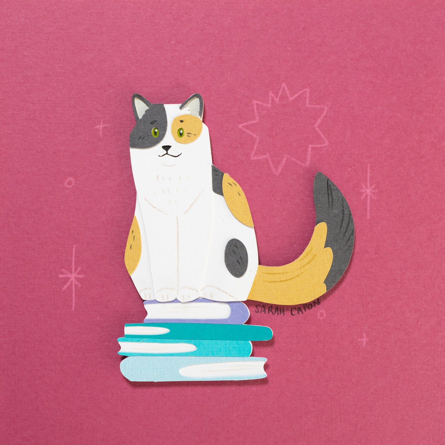 Calico Cats on Books