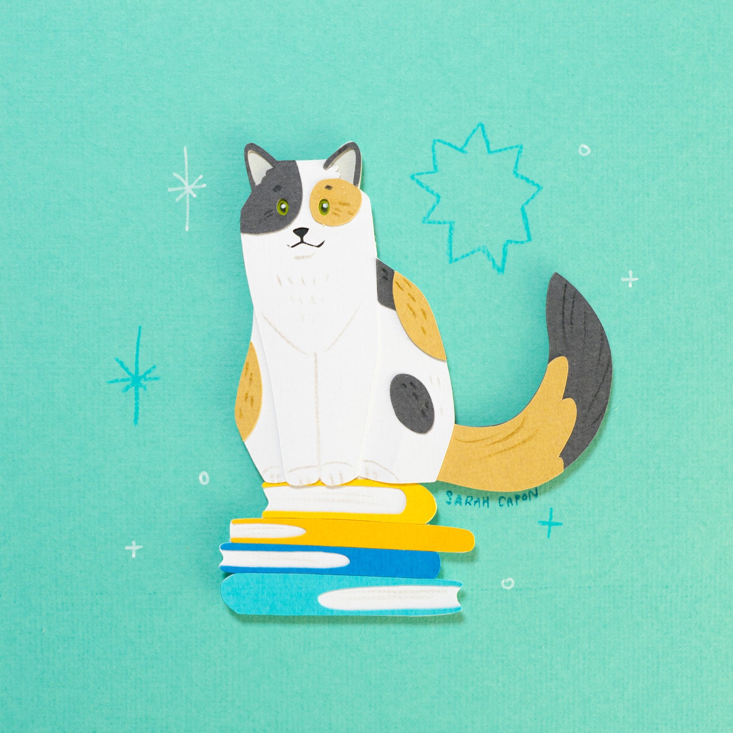Calico Cats on Books