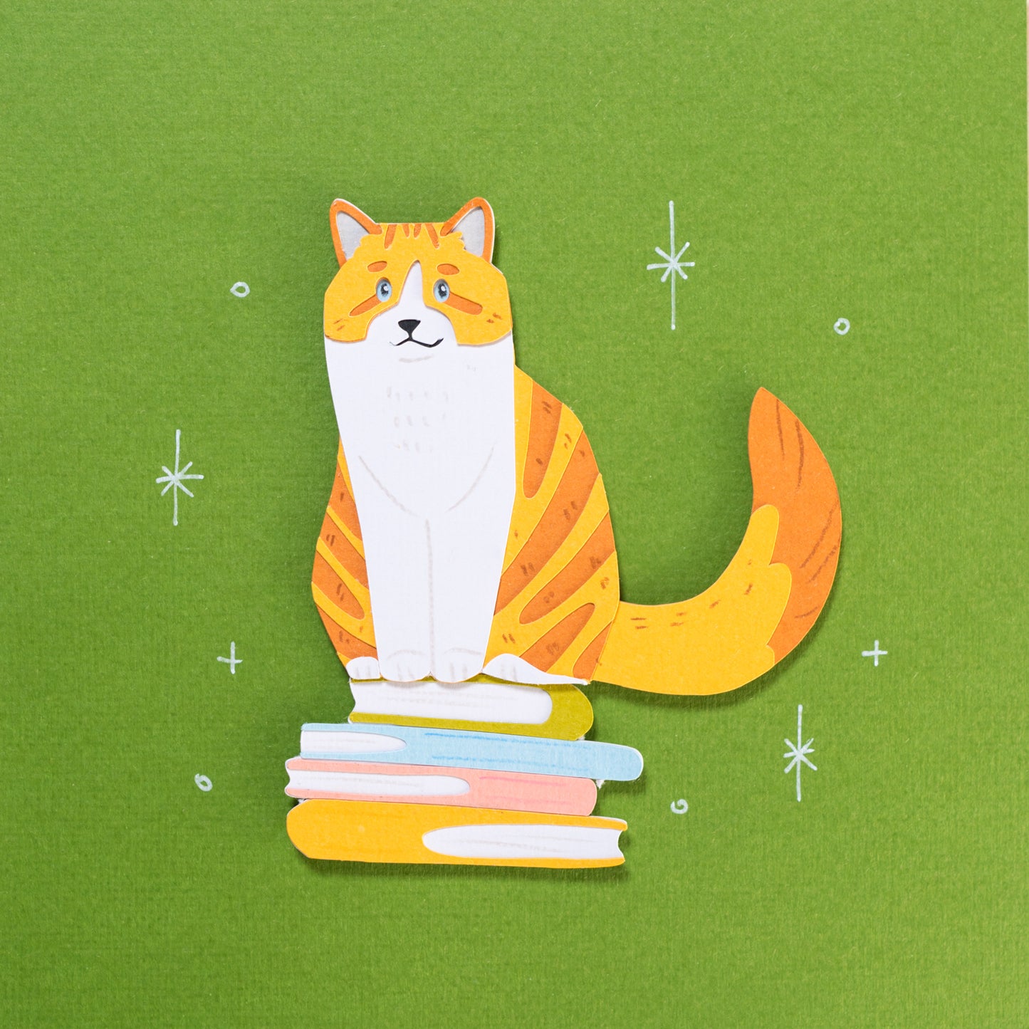 Tabby cats on Books