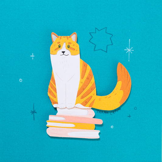 Tabby cats on Books