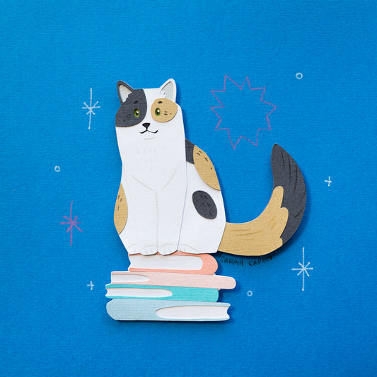 Calico Cats on Books
